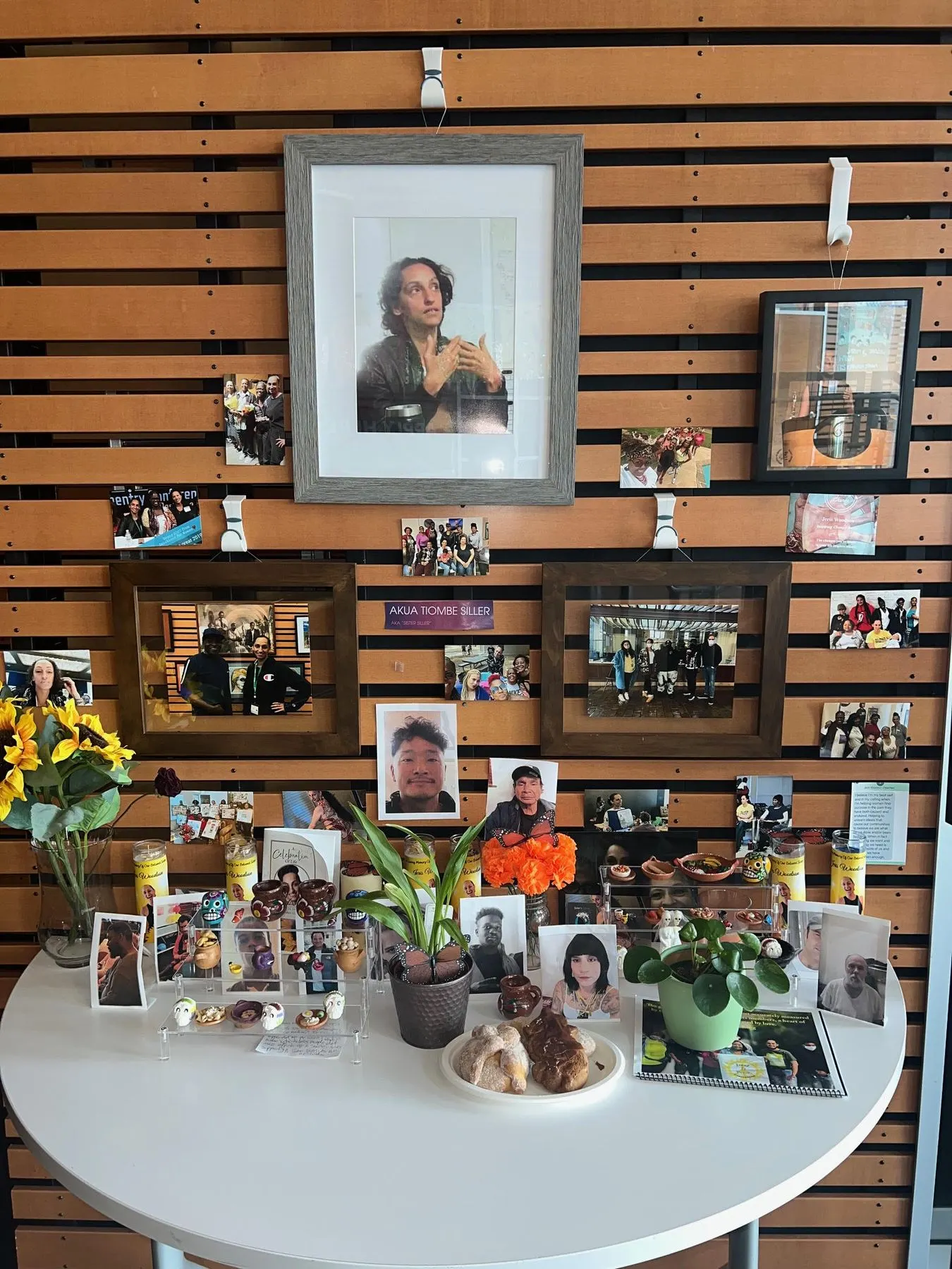 A memorial altar with photos of Jeris Woodson